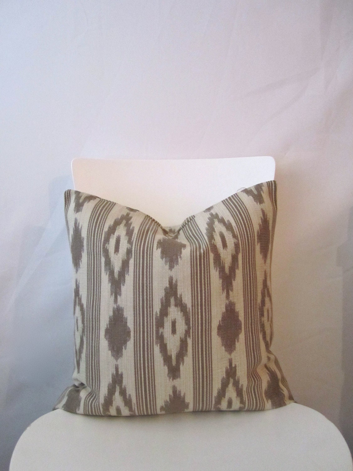 14 inch throw pillow cover, ikat tribal print. Blanket print in brown colors. For indoor use.