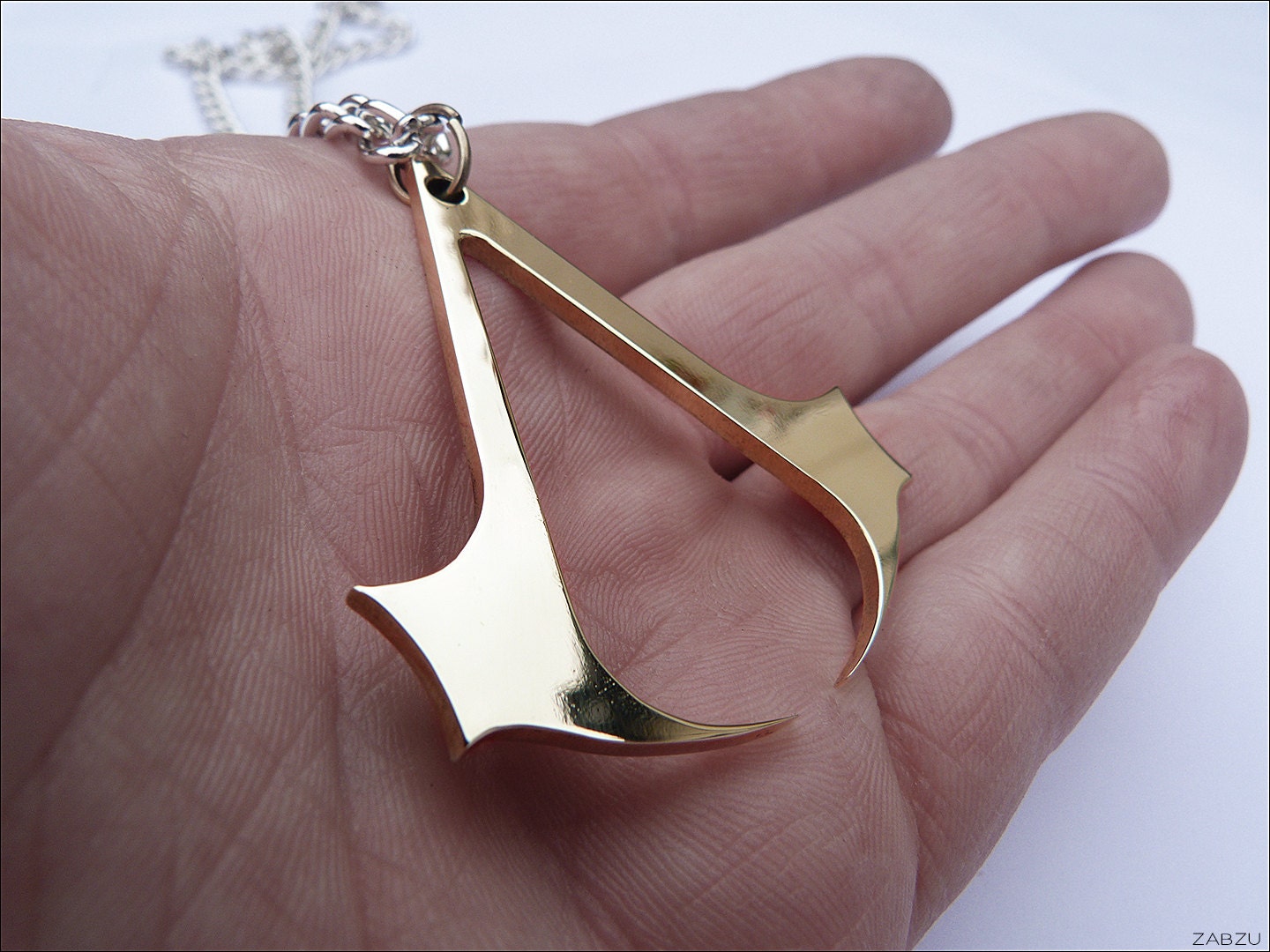 Brass Assassin's Creed Pendant