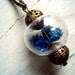 Real Dried Cornflowers in handblown glass orb, antique oriental style with bronze necklace