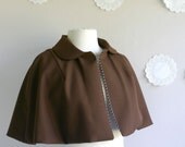 The Betty short fitted capelet in wool peter pan collar polka dot lining mad men fashion