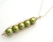 Peapod necklace. Five peas in a pod, green pearl pendant on sterling silver chain.