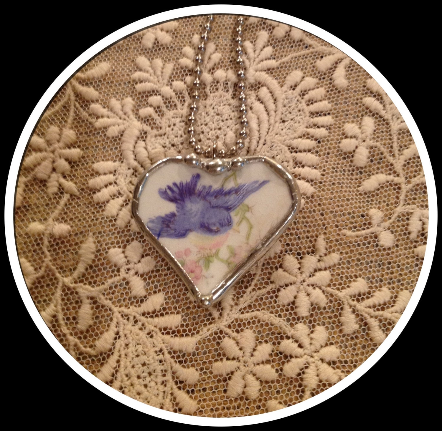 Broken china jewelry heart with sweet blue bird by the Charming Cherub pin and pendant