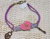 Vintage Style Embossed Heart and Charm Bracelet with Leather Cord