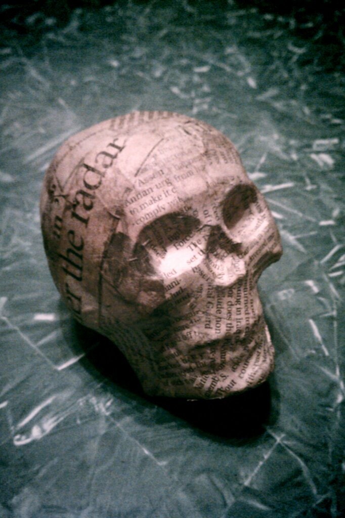 Plaster Skull w/ Newsprint From The Apocalypse