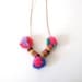 wooden necklace with pompons