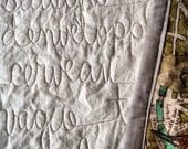 french poetry quilt with paris map fabric -- baudelaire paysage -- quilted into large throw