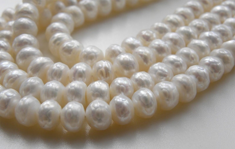 Off White Faceted Pearls 7.5 mm x 6 mm FULL 16 inch strand