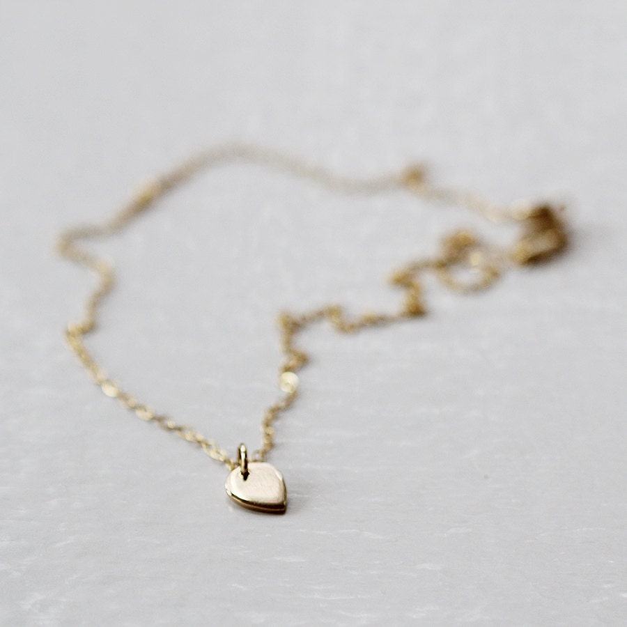 ace - gold necklace by elephantine