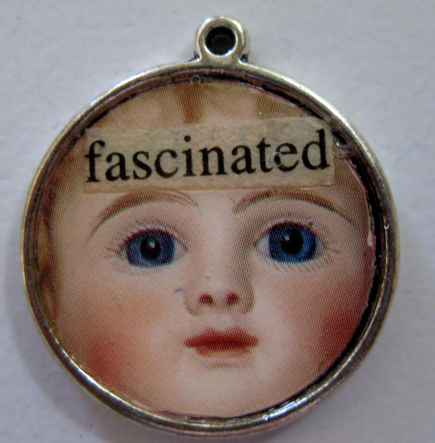 Altered art charm handmade collage jewelry supplies doll face child mittens charm bracelet
