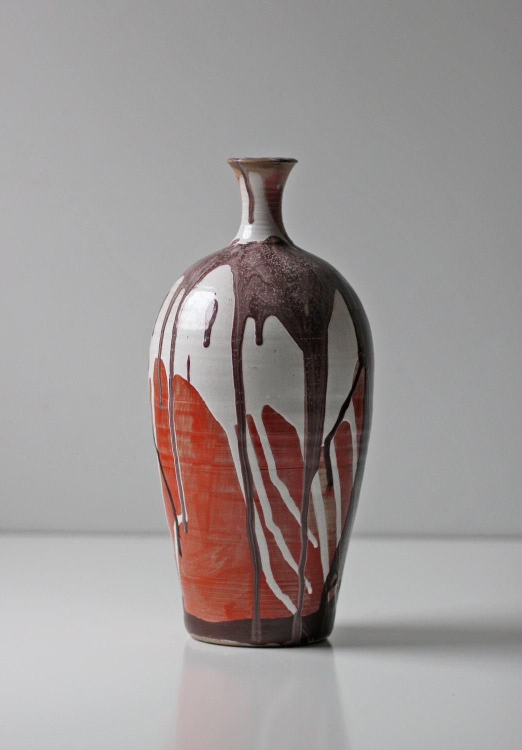 drip glazed studio pottery vase brown red white colors