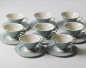 set of 8 powder blue footed teacup and saucers in excellent condition