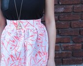 Orange Print Mini Skirt