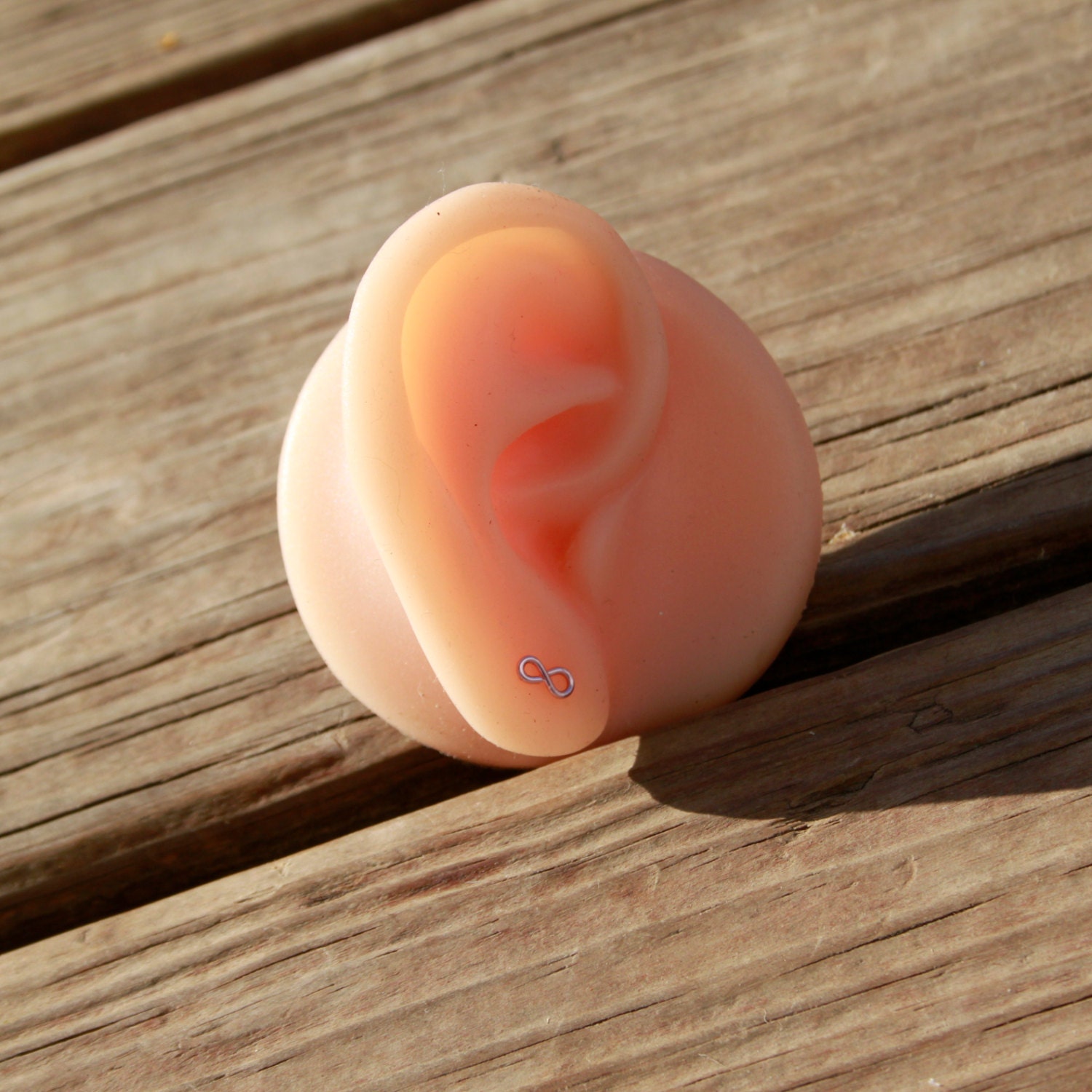 Infinity Stud Earrings.