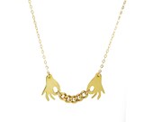 two hands - gold curb chain necklace