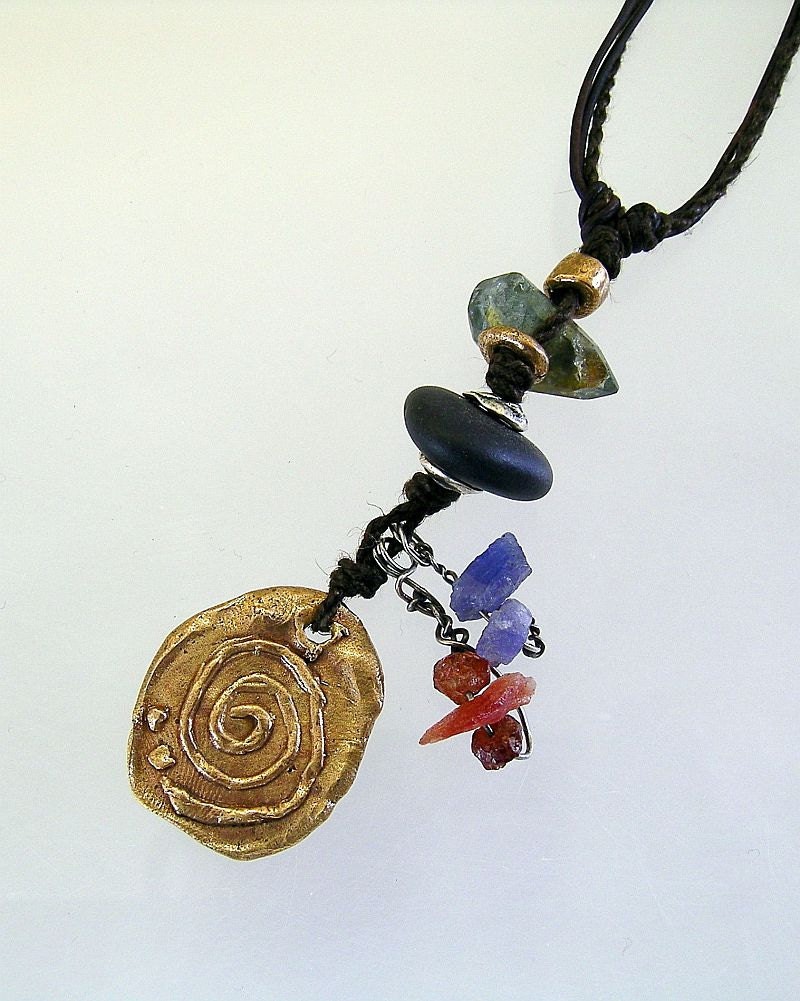 I Am Grounded, All One Talismans, Bronze Medallion with Bronze and Fine Silver Discs, Sunstone, Tanzanite, Moss Aquamarine and Beach Pebble
