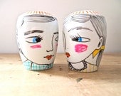 Hand painted ceramic salt and pepper shakers boy & girl