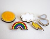 Whatever the weather. Brooch Set. Hand Painted, Laser Cut,  Sustainable Birch Wood. Box of Six. Made in Brighton, England.