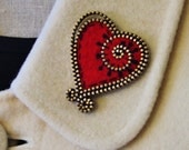 felt and zipper heart brooch with extra swirls ......  your choice of color