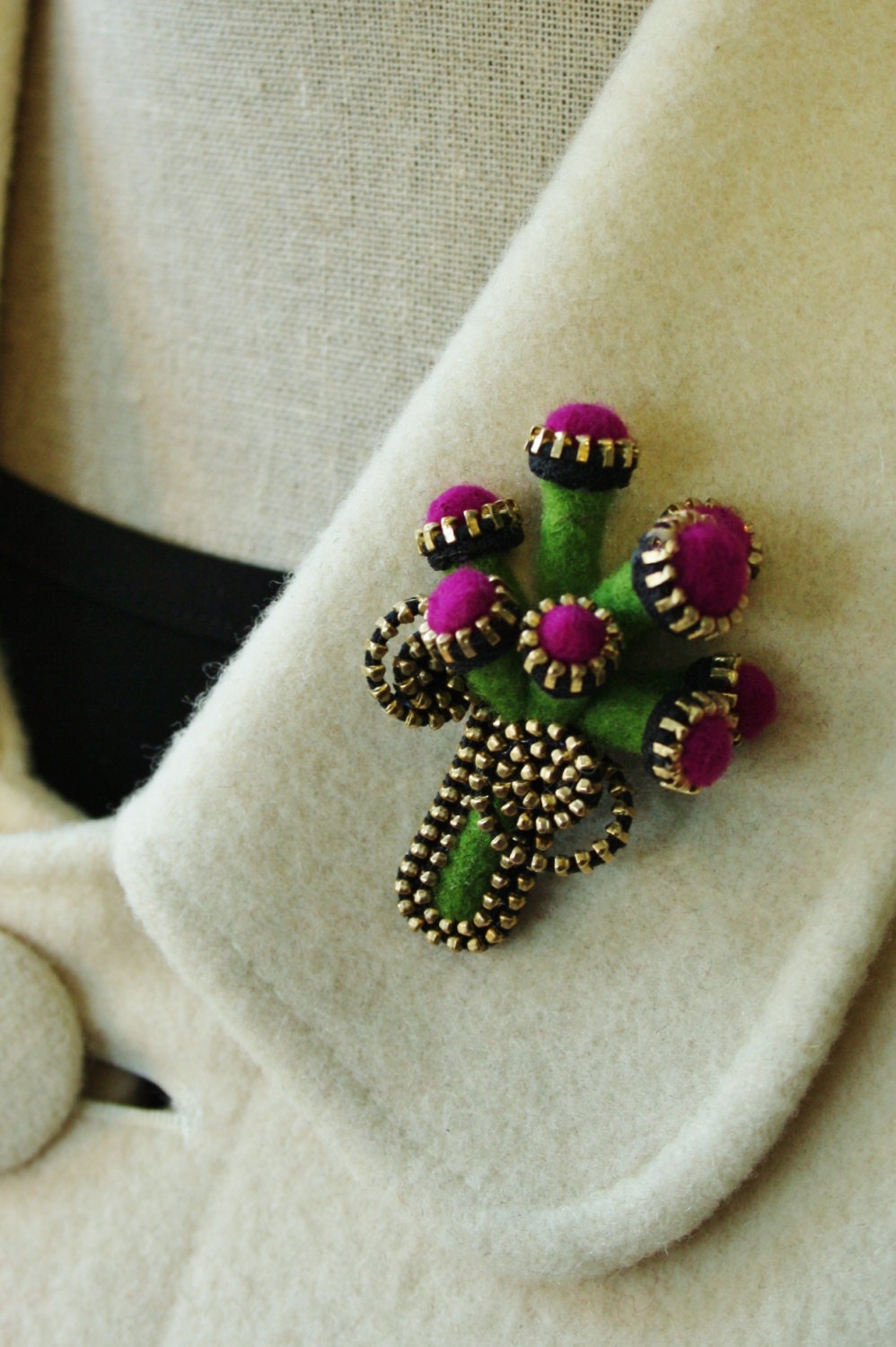 Felt and zipper  pod brooch