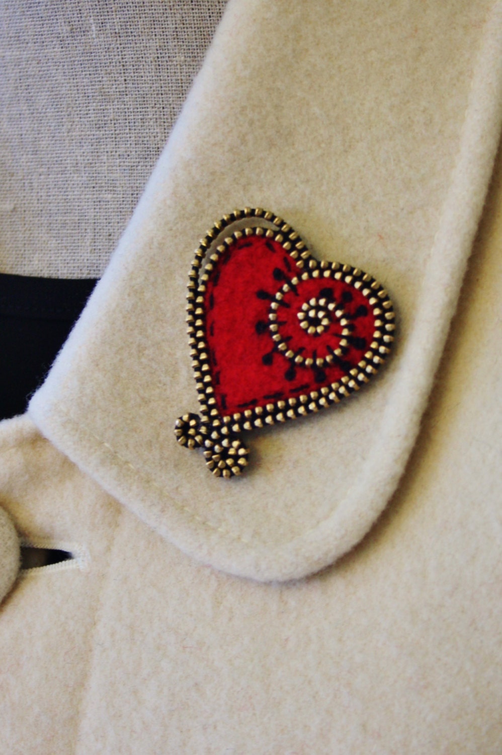 felt and zipper heart brooch with extra swirls ......  your choice of color