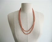 1920s Terra Cotta Flapper Necklace.