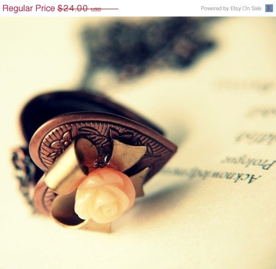 ON SALE Sweet Nothings. A Lovers rose and heart locket.