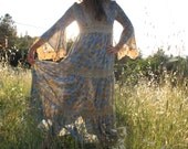 Candi Jones 70s Empire Waist Bell Sleeve Smocked Dress