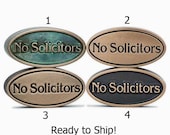 No Solictors 3x2 inch Bronze small oval sign by Atlas Signs and Plaques Ready to Ship