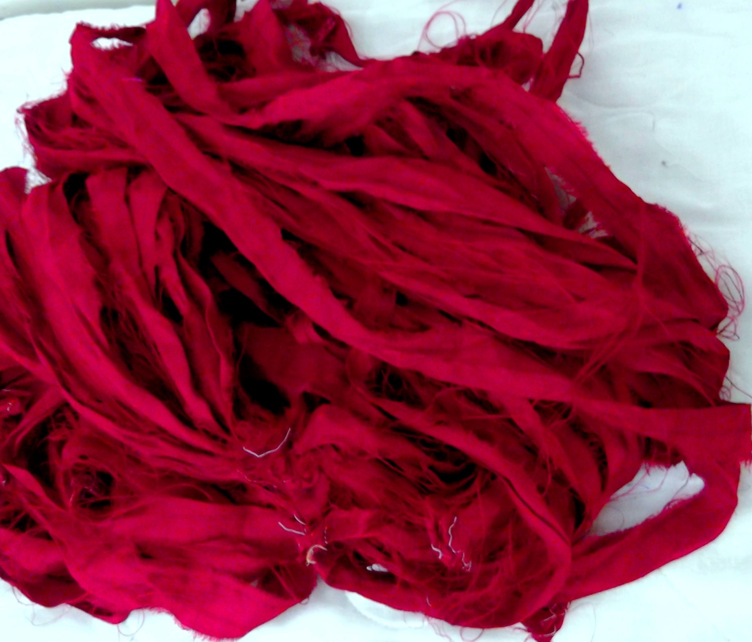 1 skein 101 grams Recycled Silk Soft Ruby Red approximately 24 yards