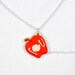Special edition IOU Apple necklace in printed wood for Sherlock / Moriarty fans