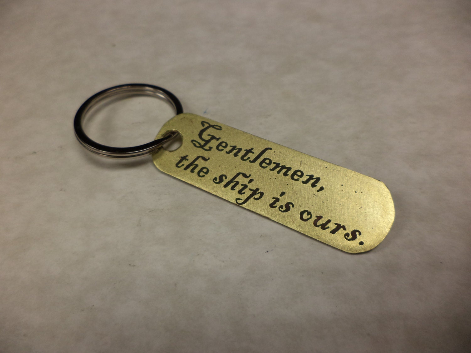 Pirates inspired etched brass keychain