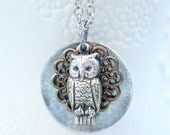 Two tone antique silver and antique brass filigree disc owl necklace.  Whimsical cute necklace.