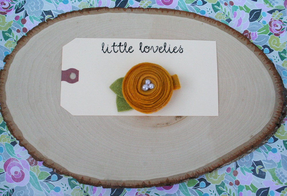 Mustard yellow felt rosette hair clip