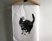 White teatowel with cat