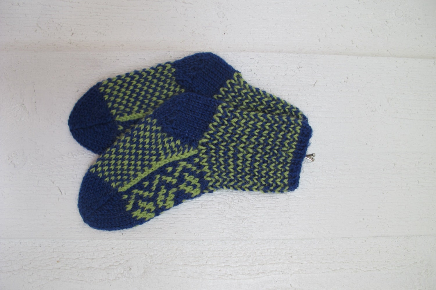 Handknitted norwegian socks in blue and green for children
