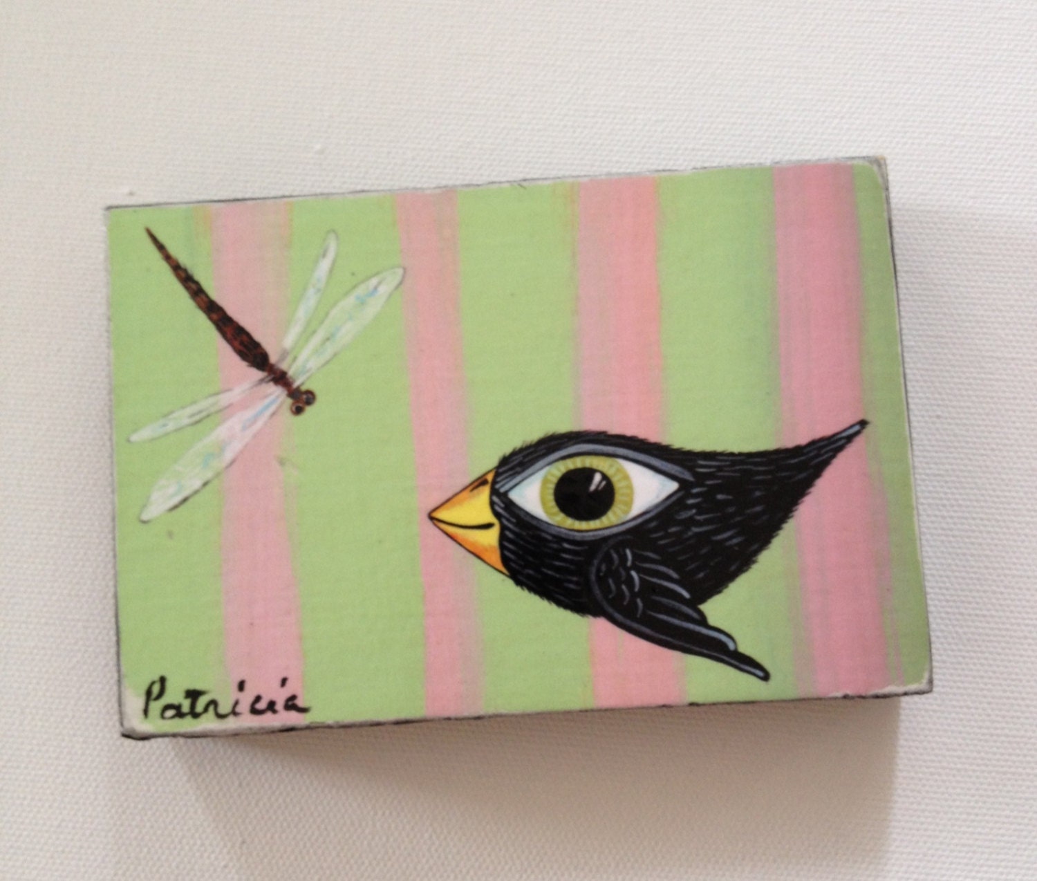Little flying bird and dragonfly print on wood block