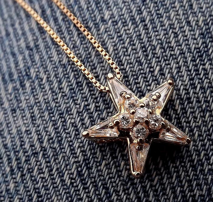 1970s sterling silver vermiel and white topaz star pendant - charity for animals