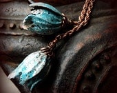 Lariat necklace with turquoise blue enameled tulips, copper chain