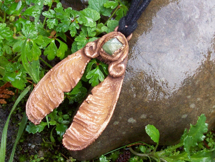 Maple seeds and peridot