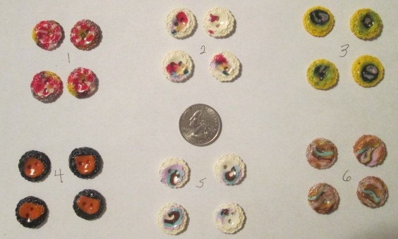 Clay buttons round with decorative edge 4 per set. Embellish your crafts, cards, scrap books