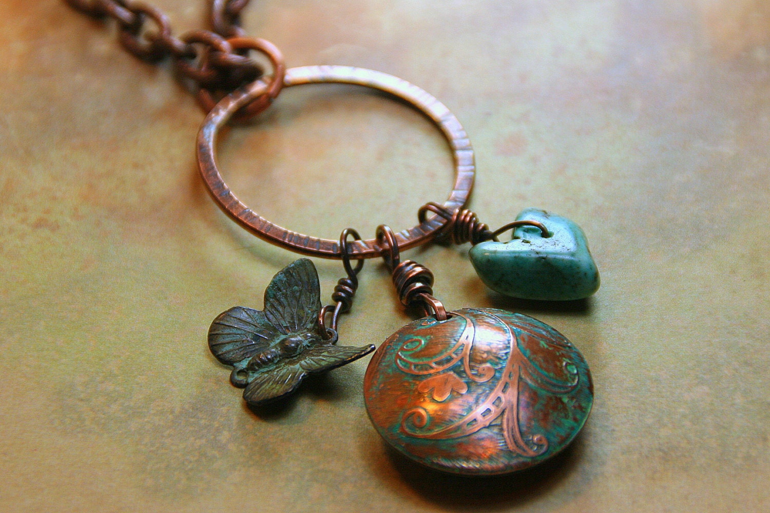 Hand Etched Paisley Copper Lentil with Charms - Necklace