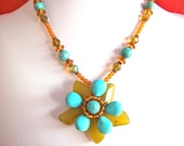 Gemstone flower necklace wire wrapped with green and turquoise gemstone and copper beads