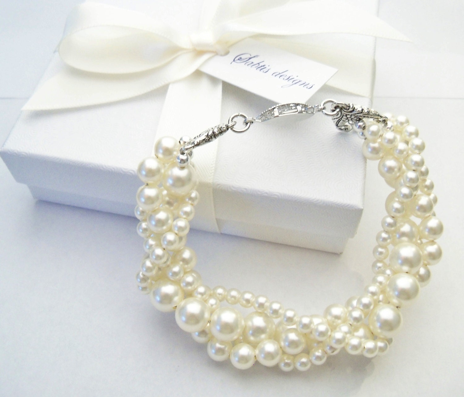 Twisted pearl bracelet Ivory Swarovski crystal pearl multi strand twisted bracelet with antiqued silver clasp bridal