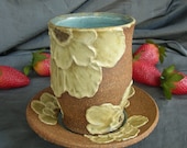 Ceramic Teacup and Saucer with Flowers in Sky Blue, Sun Yellow and Speckle Brown Clay