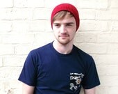 Mens beanie hat, red knit hat, plain basic menswear fashion.