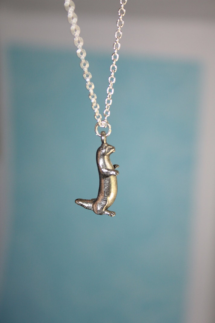Tiny Otter Necklace on a sterling silver plated chain