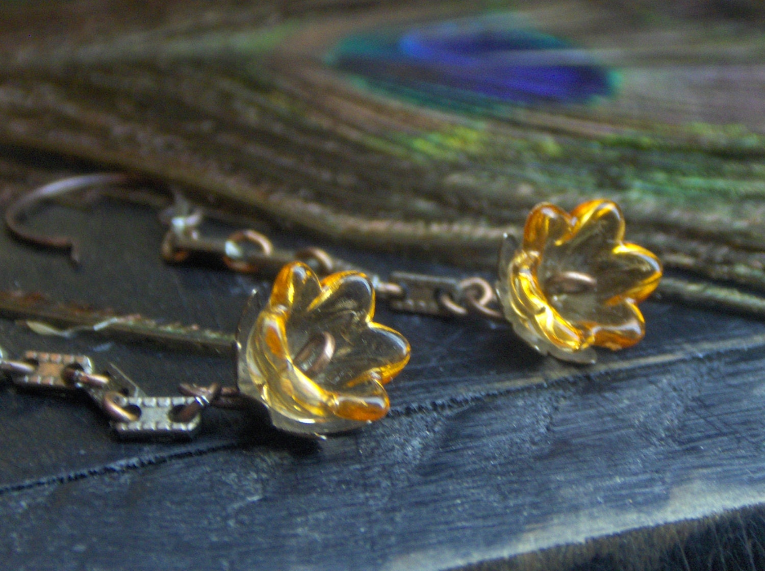 WHISKEY BLOSSOMS. Amber-Orange lucite bell flower & rustic copper earrings.