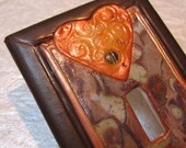 Craftsman inspired switch plate single toggle in orange, pistachio green, and chocolate brown