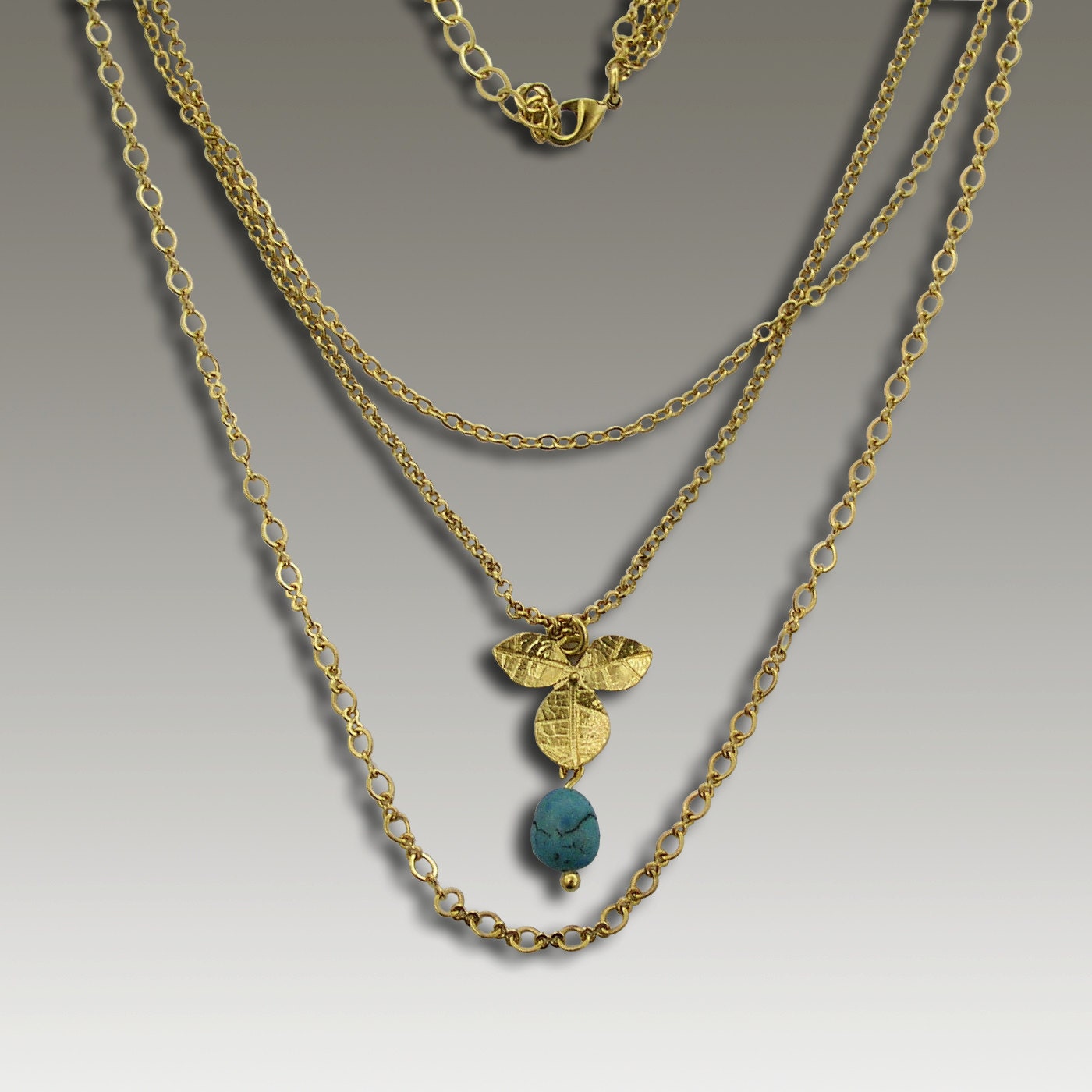 24k plated gold leaf necklace with turquoise stones. - Blue Garden