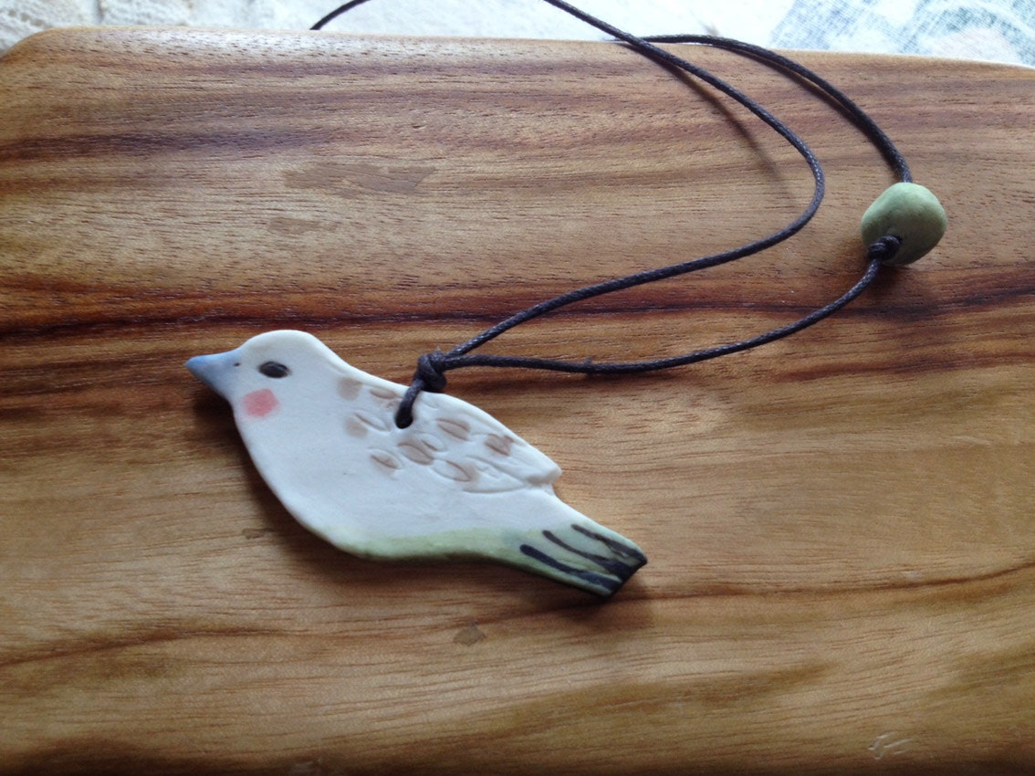 RESERVED   Double sided Bird pendant 2  Handmade ooak porcelain work
